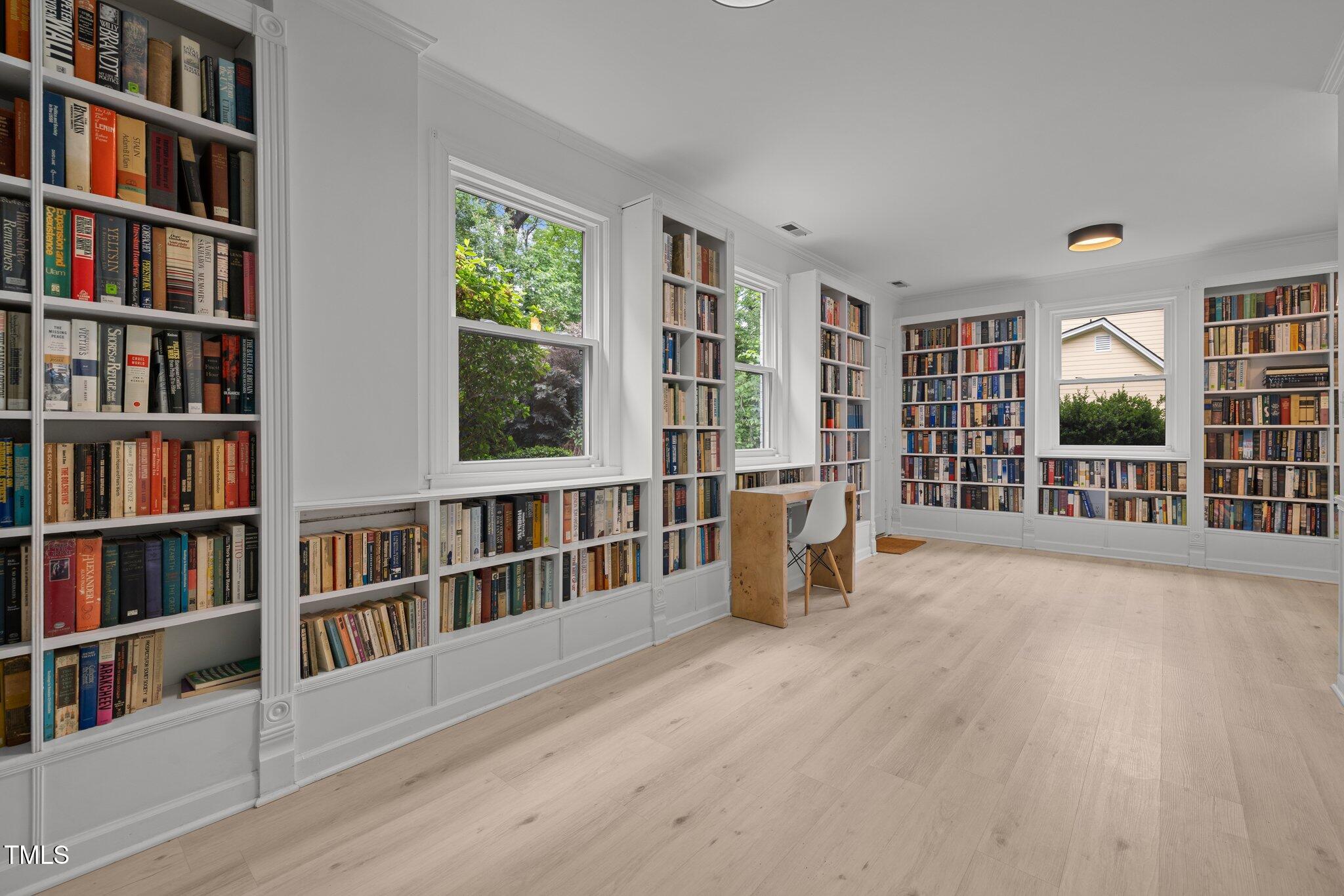 1706 Rangecrest Road Raleigh, NC 27612 - Photo 28 of 43 a view of an empty room with shelves