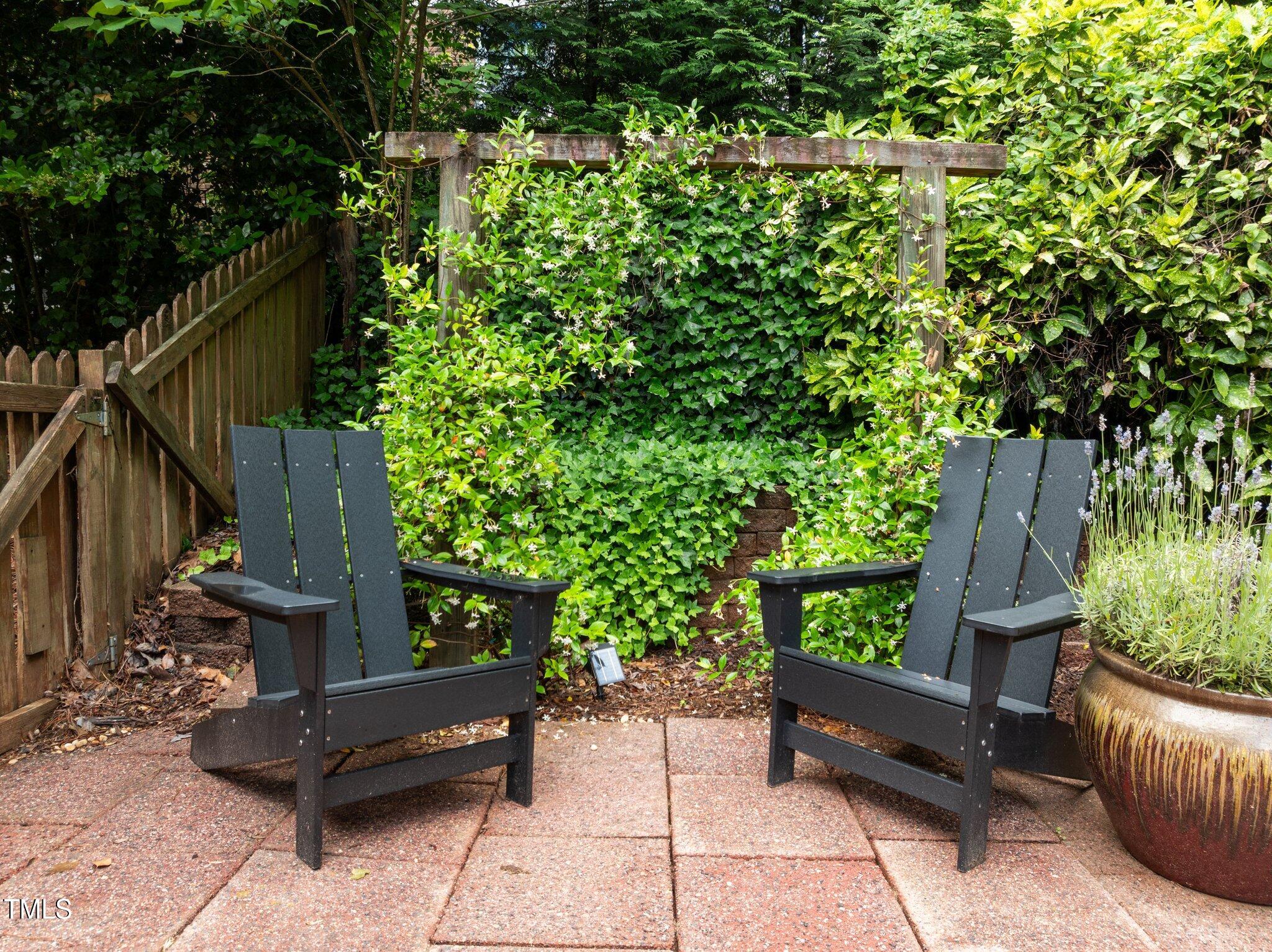 1706 Rangecrest Road Raleigh, NC 27612 - Photo 34 of 43 a view of a couches in backyard of house
