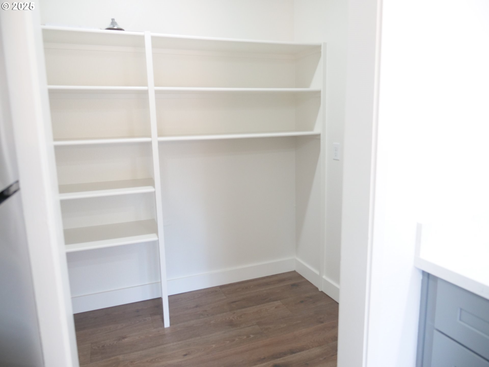 45 Eagle Crest Drive, Unit 407 Lake Oswego, OR 97035 - Photo 15 of 28 a view of a room with rack on the wall