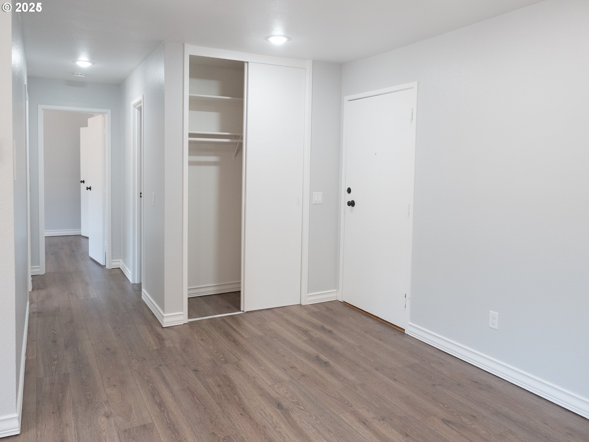 45 Eagle Crest Drive, Unit 407 Lake Oswego, OR 97035 - Photo 4 of 28 a view of a room with wooden floor