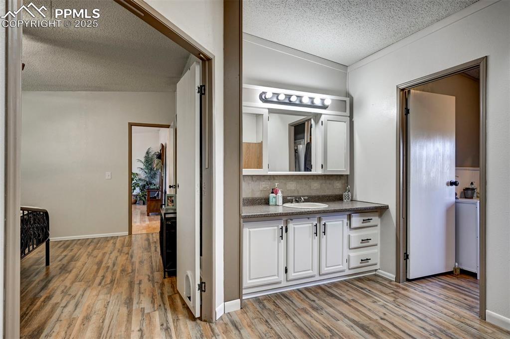 35355 Funk Road Calhan, CO 80808 - Photo 23 of 31 a view of a bathroom from the hallway