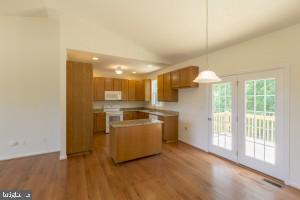 790 Brickhouse Road Louisa, VA 23093 - Photo 26 of 28 "Open" Plan fireplace in BSMNT, Kit Island