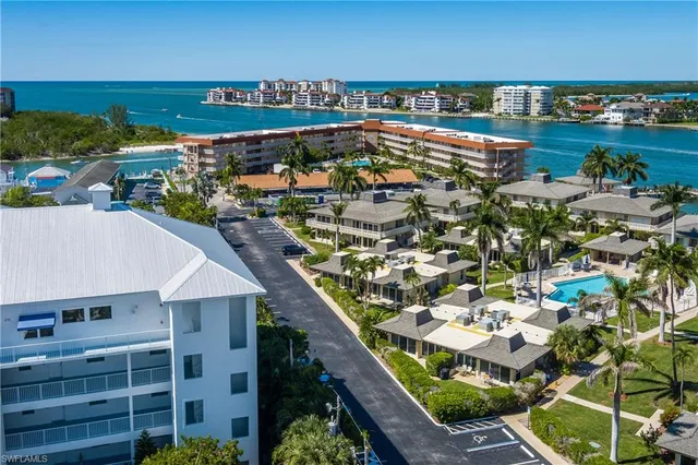 a view of a city with lawn chairs