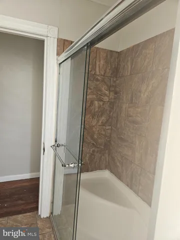 a bathroom with a bathtub