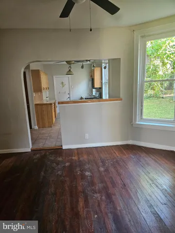 a view of a hardwood floor in a room