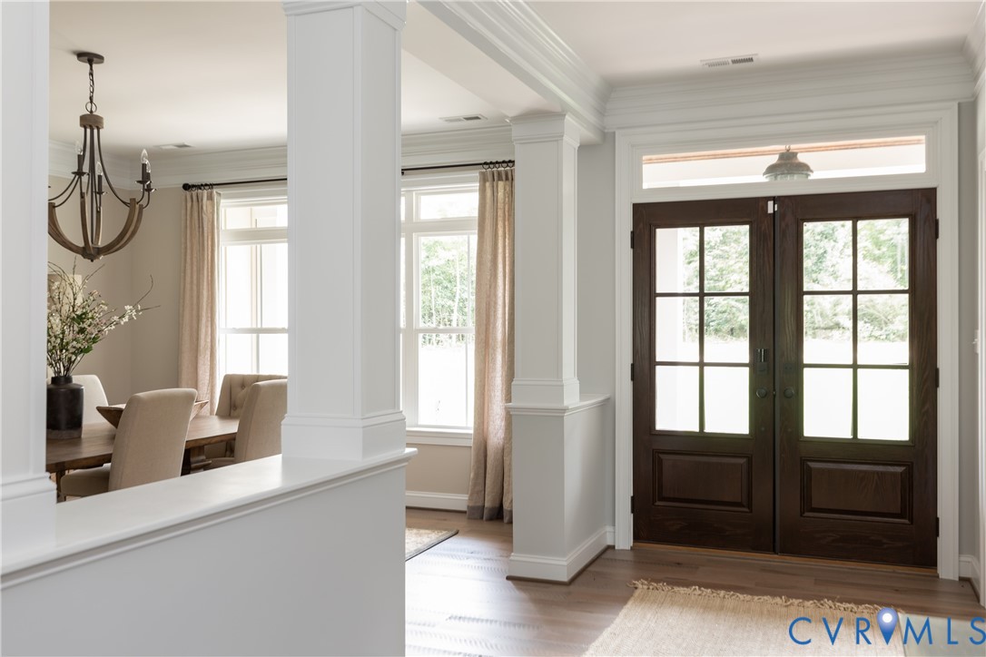 Lot 23 North Shore Road Locust Hill, VA 23092 - Photo 5 of 30 a view of a livingroom with wooden floor and windows