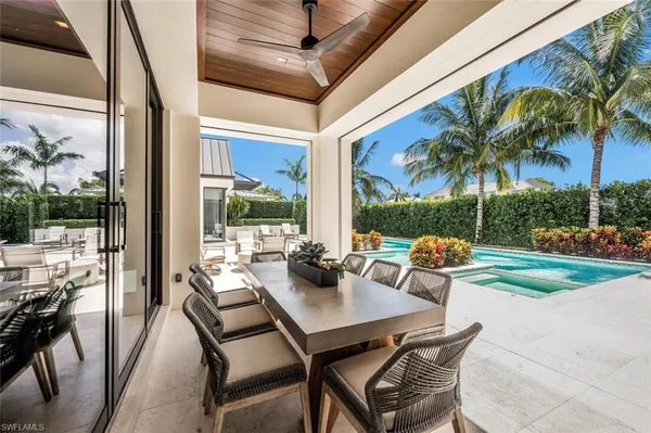 a view of an outdoor space with furniture and garden