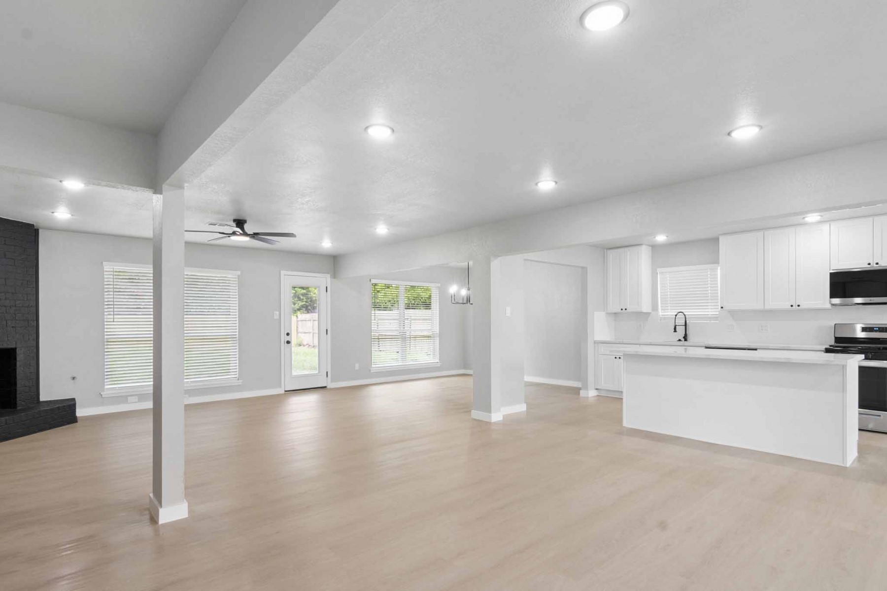 10423 Quiet Hill Road La Porte, TX 77571 - Photo 4 of 27 Open Concept with Luxury Vinyl Flooring Throughout