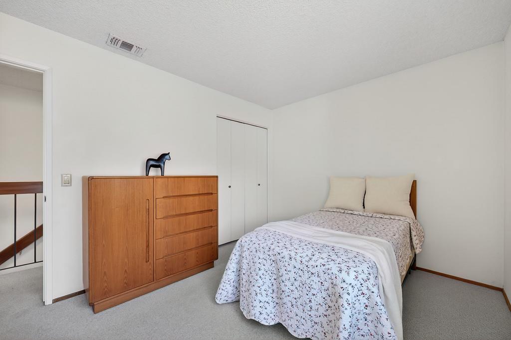 7059 Lompoc Court Citrus Heights, CA 95621 - Photo 33 of 53 a bedroom with a bed and a closet