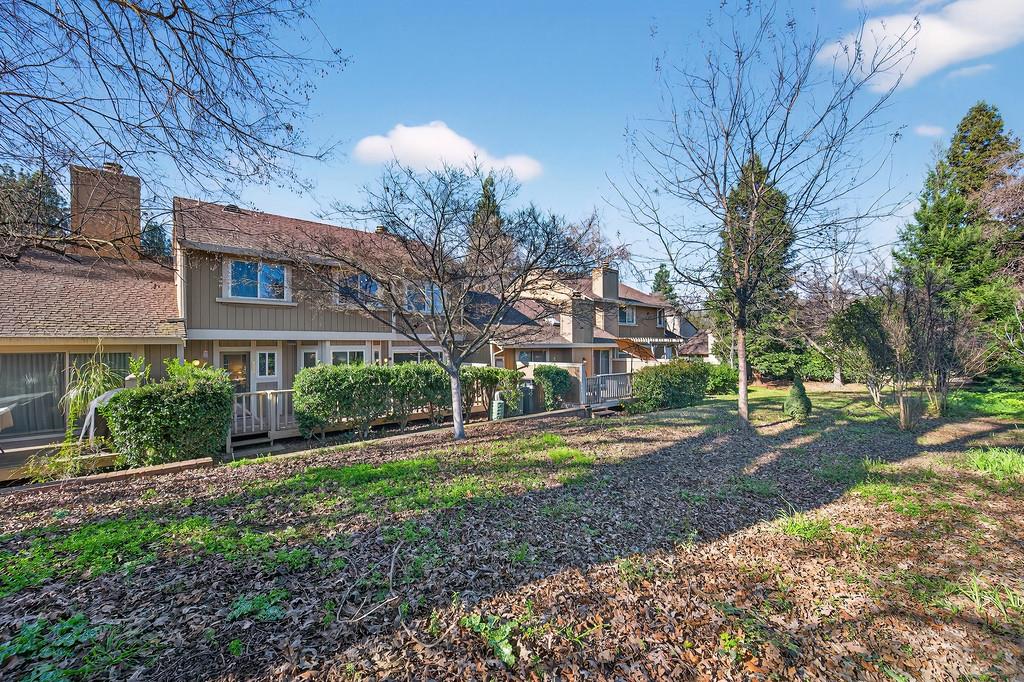 7059 Lompoc Court Citrus Heights, CA 95621 - Photo 45 of 53 a view of a brick building next to a yard