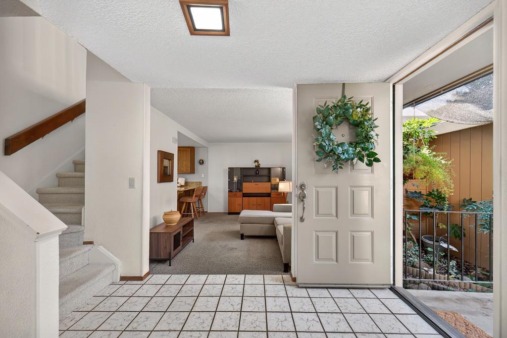 7059 Lompoc Court Citrus Heights, CA 95621 - Photo 8 of 53 a living room with furniture and a potted plant