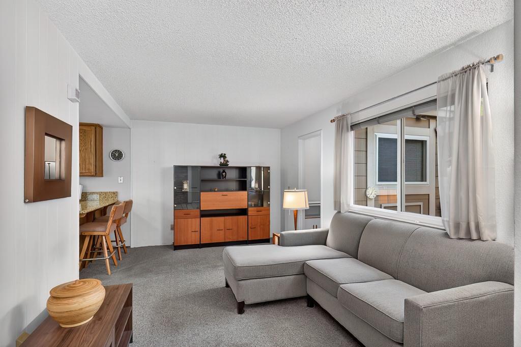 7059 Lompoc Court Citrus Heights, CA 95621 - Photo 10 of 53 a living room with furniture and a window