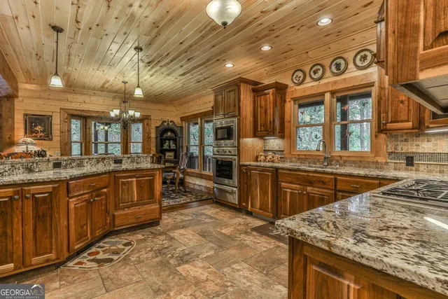 a view of a chairs and table in a patio