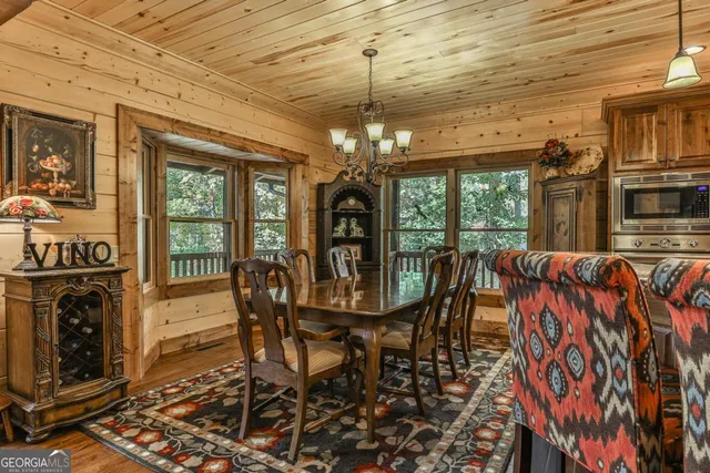 a view of a balcony with wooden floor