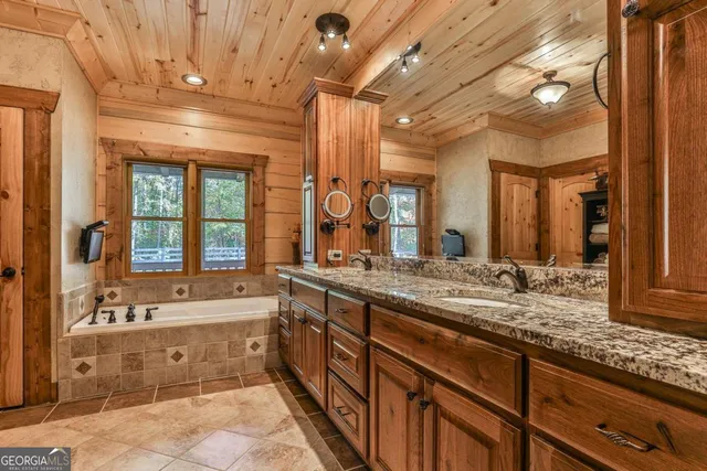 a view of a balcony with wooden floor
