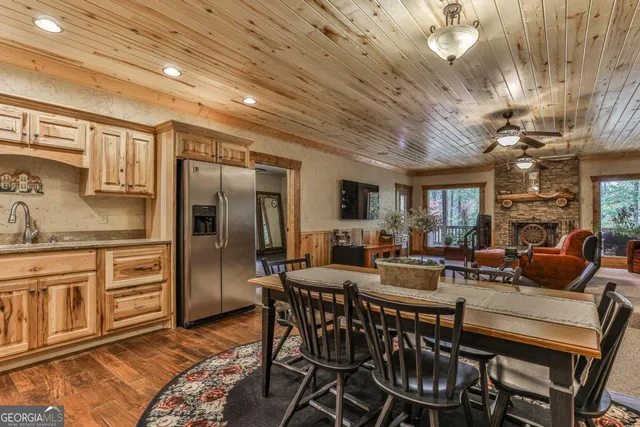 a view of a room with wooden walls