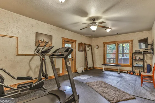 a bed room with two beds and a fireplace