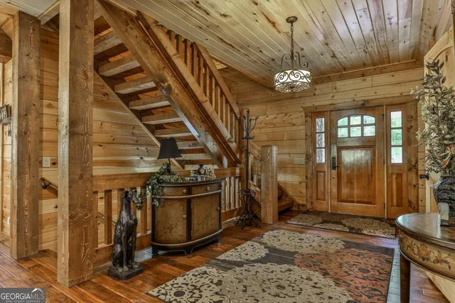 a kitchen with stainless steel appliances granite countertop a stove sink and cabinets