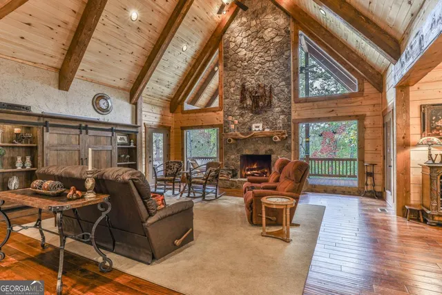 a kitchen with stainless steel appliances granite countertop a sink and cabinets