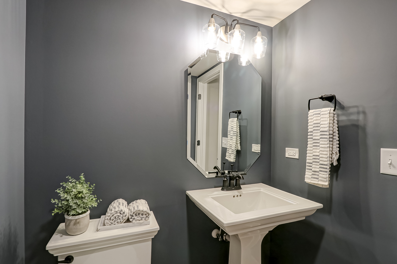 4465 Chelsea Mnr Circle Aurora, IL 60504 - Photo 20 of 30 a bathroom with a sink toilet and mirror