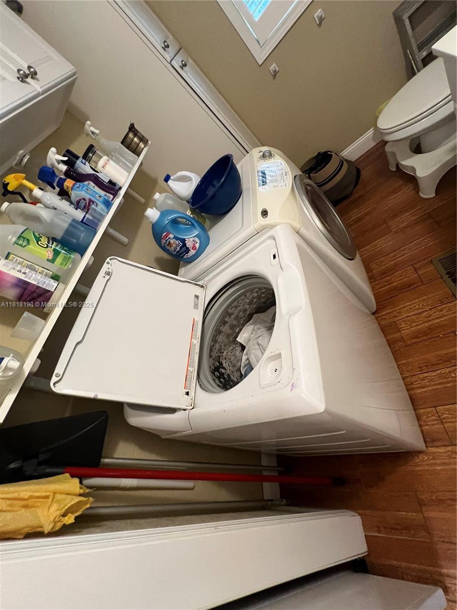 Davie Davie, FL 33324 - Photo 23 of 25 a utility room with dryer and washer