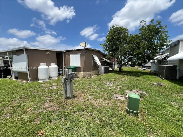 a fire hydrant in the middle of a field