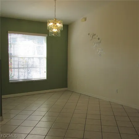 a kitchen with a cabinets and a stove top oven