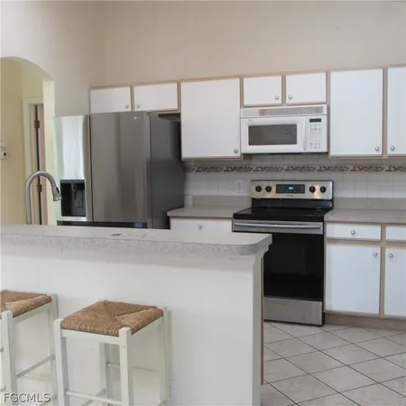 a view of a storage & utility room in a kitchen