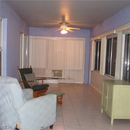 a view of a room with a large window