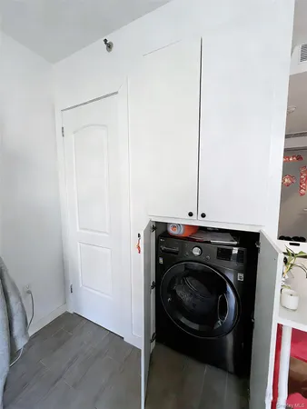 a bathroom with a sink toilet and a mirror