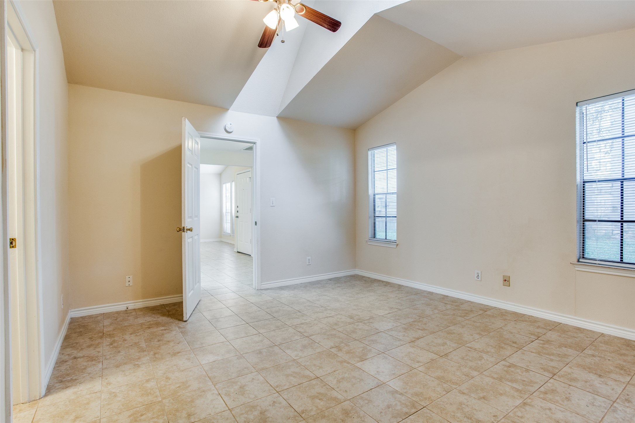 8811 Clearbrook Trail Austin, TX 78729 - Photo 26 of 38 rt B - Vaulted ceilings and ample window light define this versatile room, perfect for any use.
