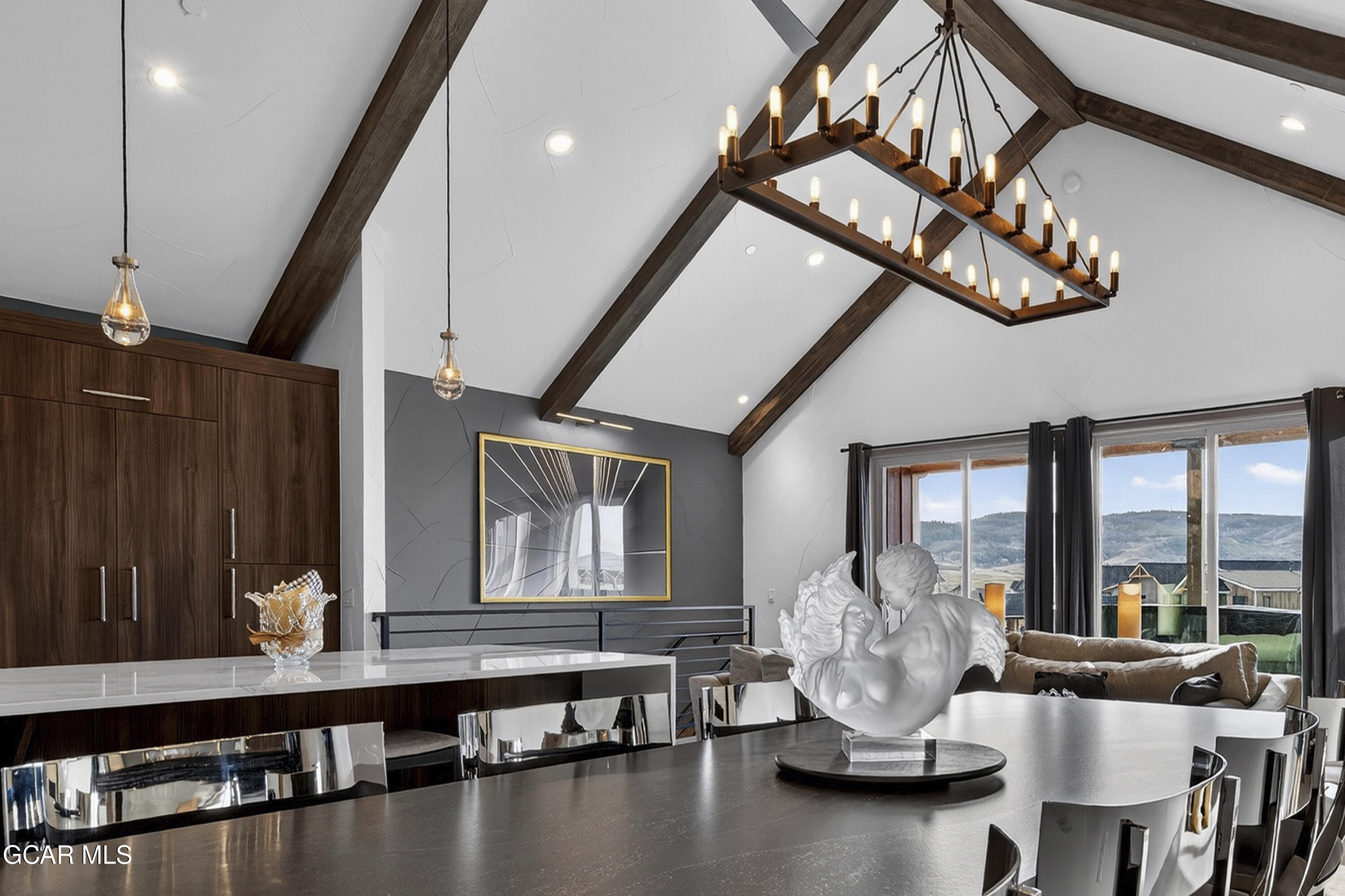 178 Eagle Ridge Drive Granby, CO 80446 - Photo 3 of 45 a room with lots of white furniture and a large window