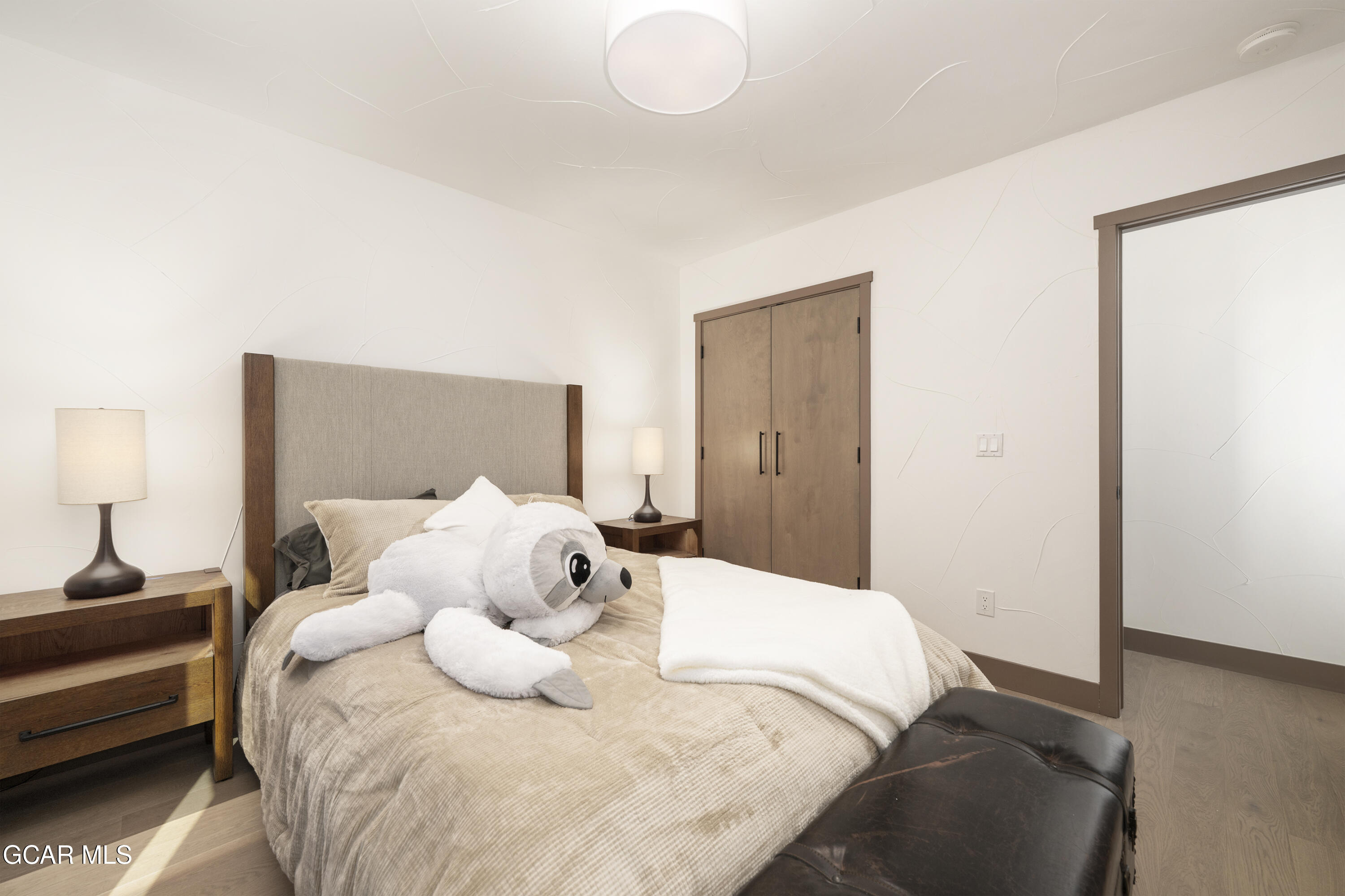 178 Eagle Ridge Drive Granby, CO 80446 - Photo 32 of 45 a large white bed in a white room