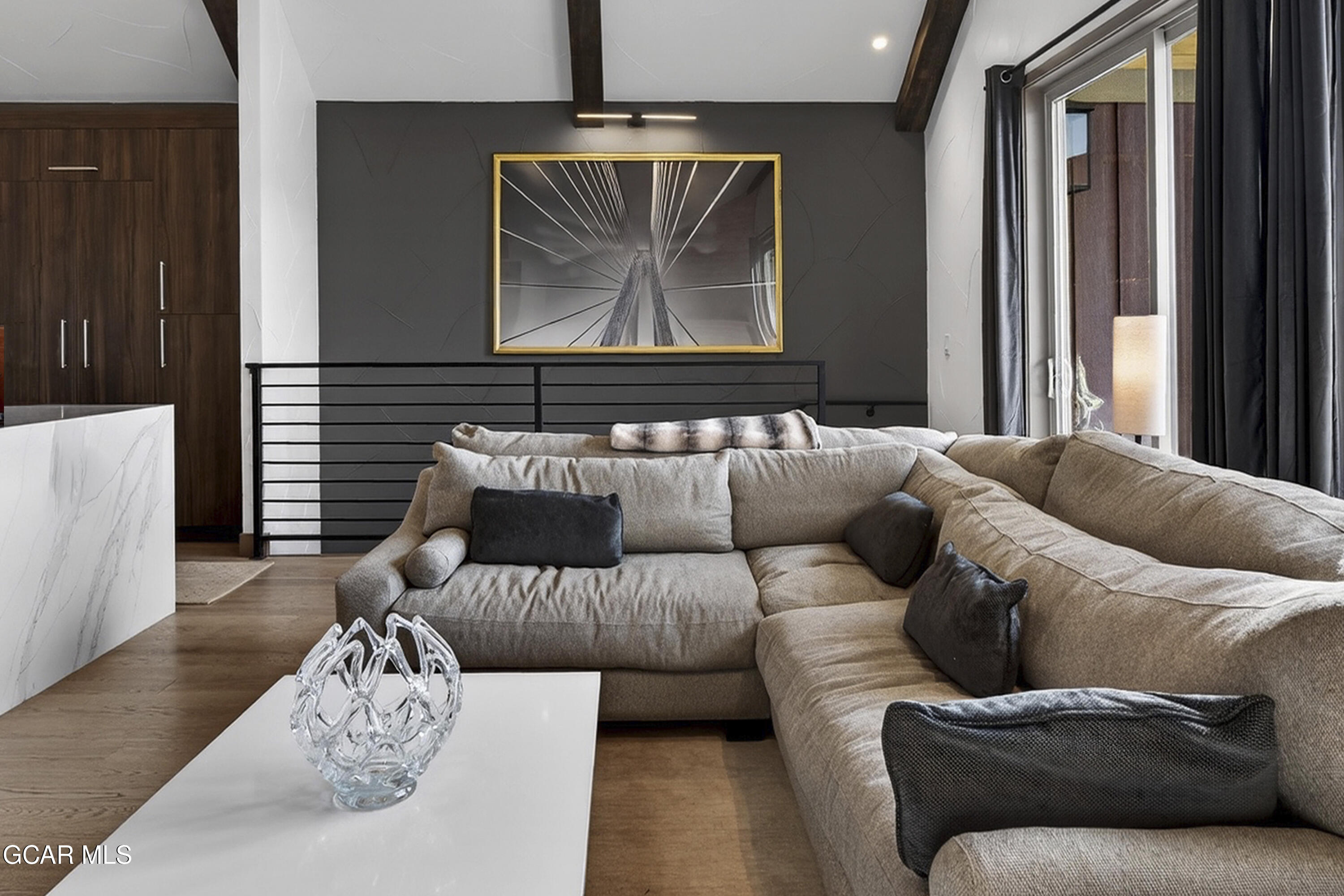 178 Eagle Ridge Drive Granby, CO 80446 - Photo 6 of 45 a living room with furniture and a large window