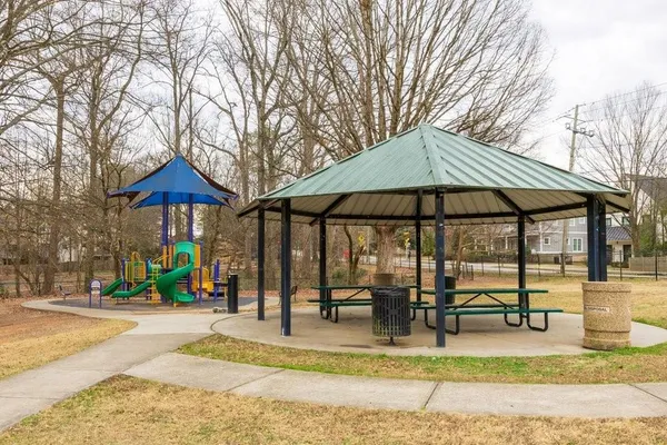 a view of a swimming pool with a lounge chair