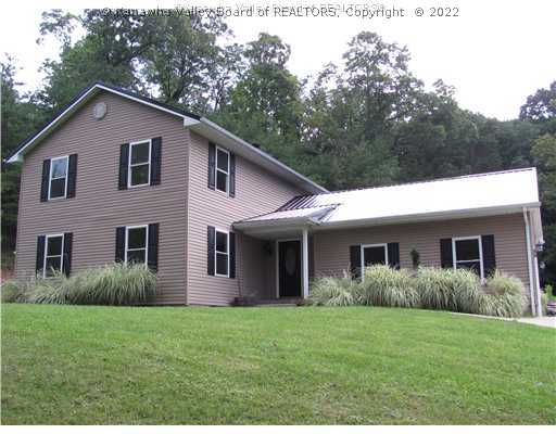 Exterior Front. Brand new metal roof!