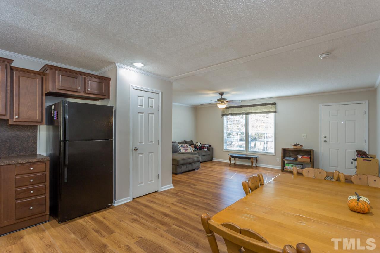 1001 Altice Drive Raleigh, NC 27603 - Photo 16 of 24 a bed room with a bed and furniture