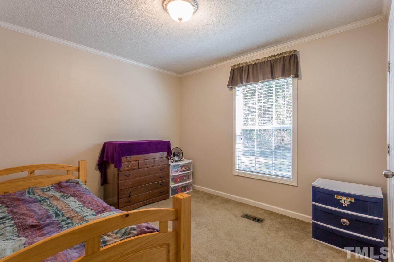 1001 Altice Drive Raleigh, NC 27603 - Photo 23 of 24 a view of workspace with furniture and window