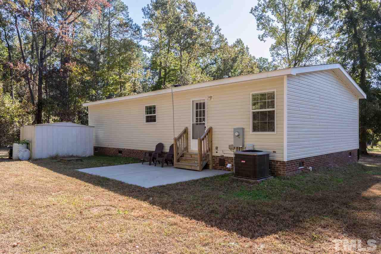 1001 Altice Drive Raleigh, NC 27603 - Photo 4 of 24 a view of back yard of the house