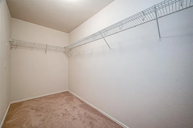 a view of a room with racks on the wall