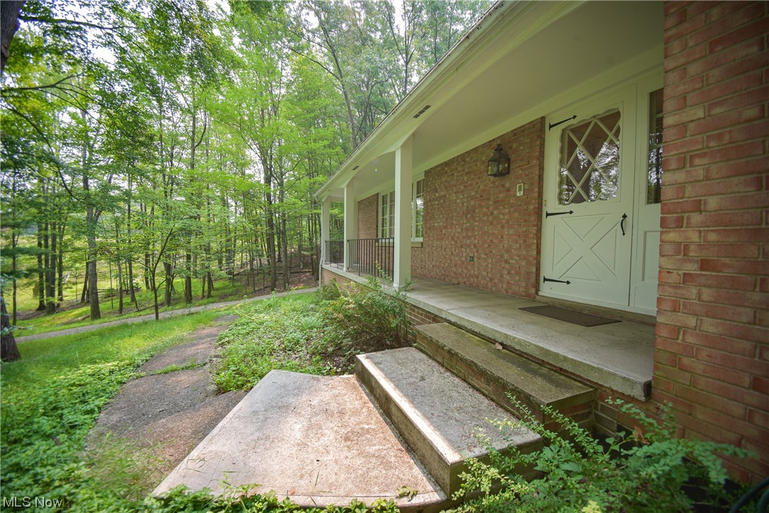 7551 West Pleasant Valley Road Cleveland, OH 44129 - Photo 3 of 35 Lovely walkway to the front porch.