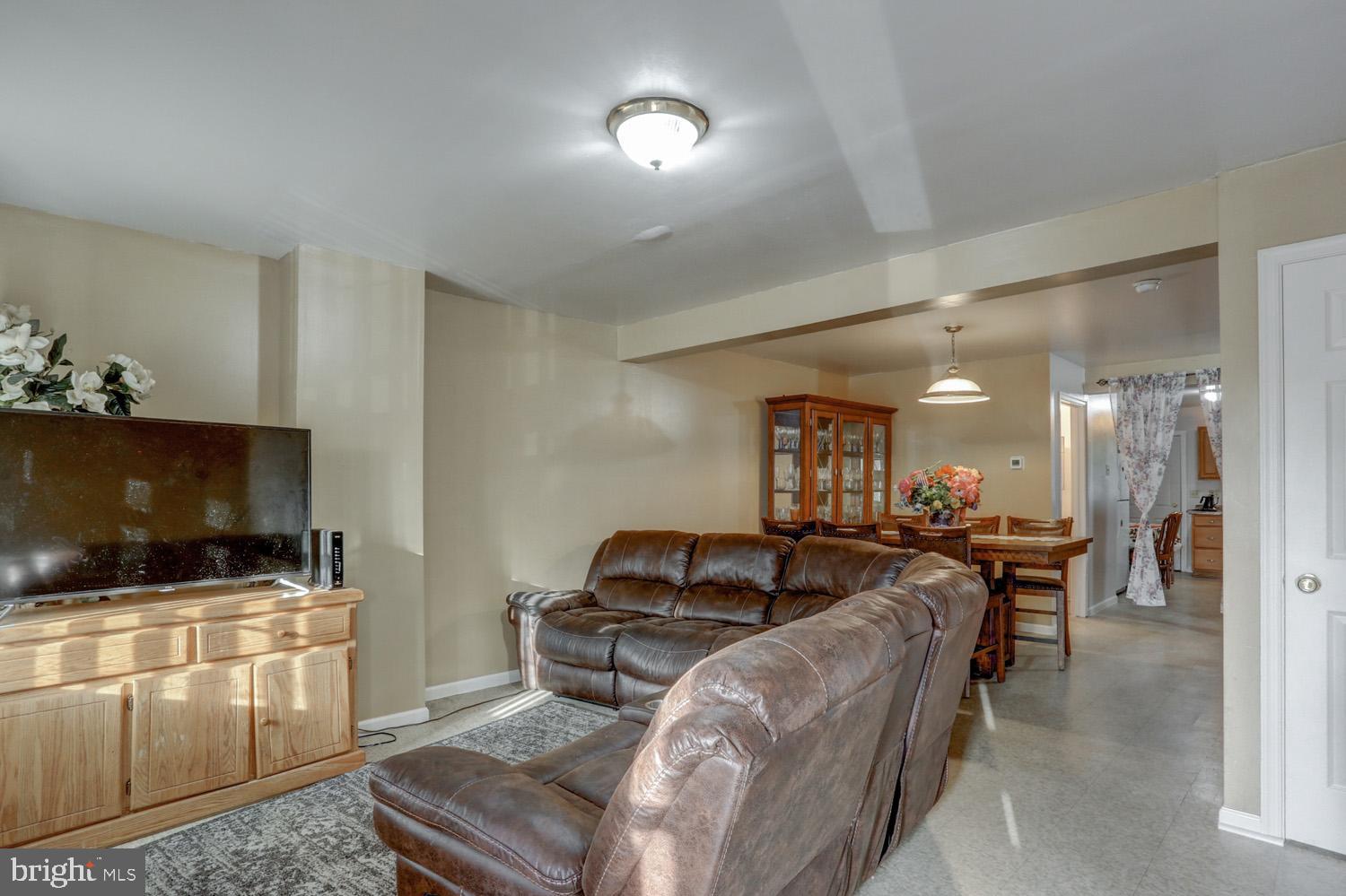 417 Green Street Lancaster, PA 17602 - Photo 10 of 37 a living room with furniture and a flat screen tv
