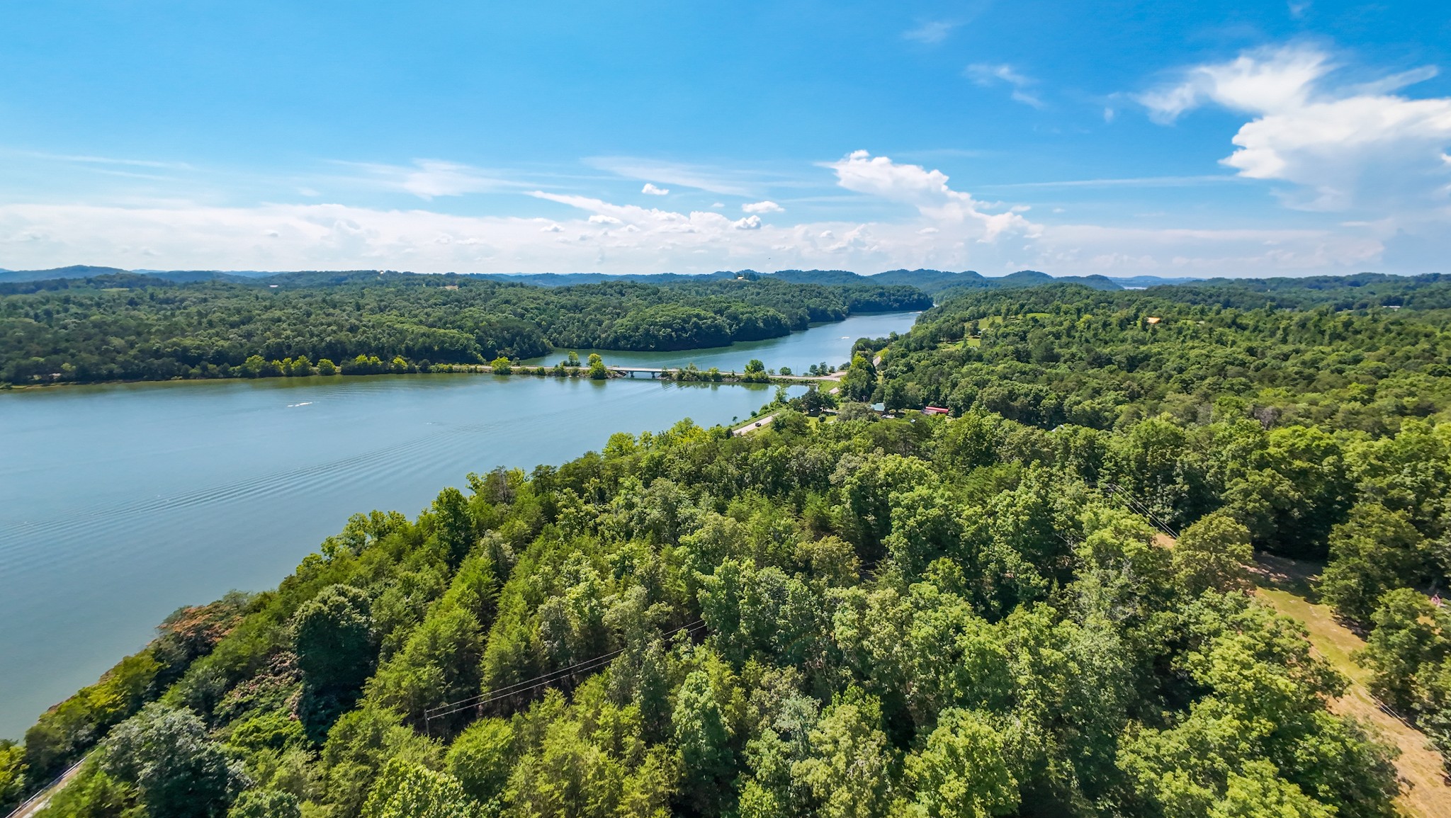 151 Citico Road Vonore, TN 37885 - Photo 11 of 23 a view of a lake with a city