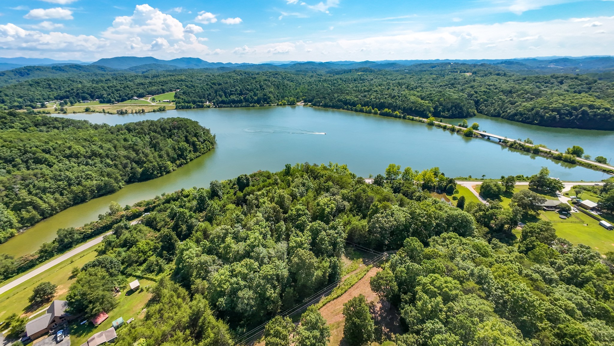 151 Citico Road Vonore, TN 37885 - Photo 14 of 23 a view of a lake with a mountain