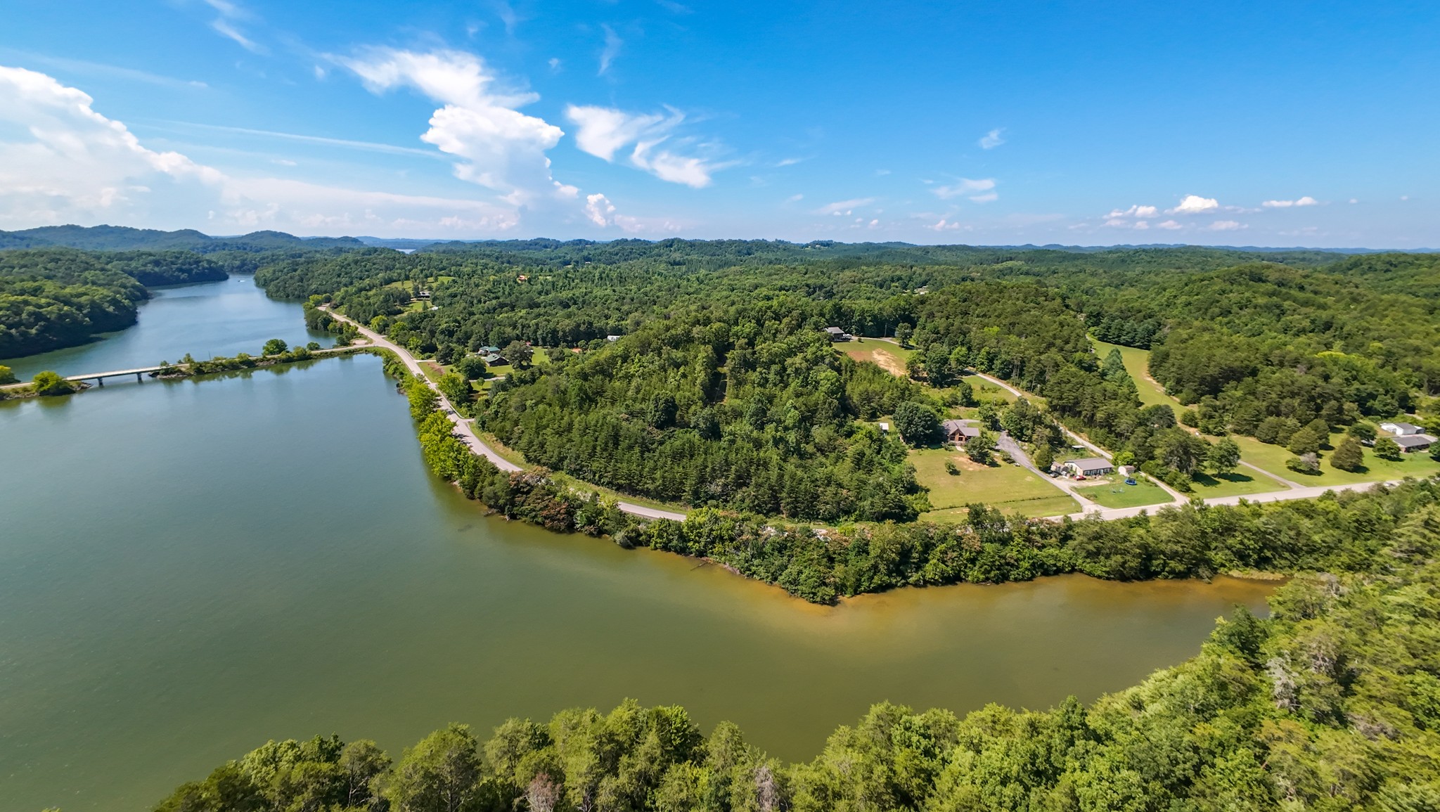 151 Citico Road Vonore, TN 37885 - Photo 23 of 23 a view of a lake with a yard