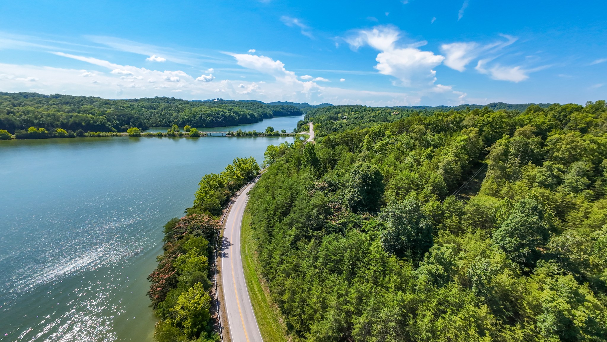 151 Citico Road Vonore, TN 37885 - Photo 5 of 23 a view of a lake with a city