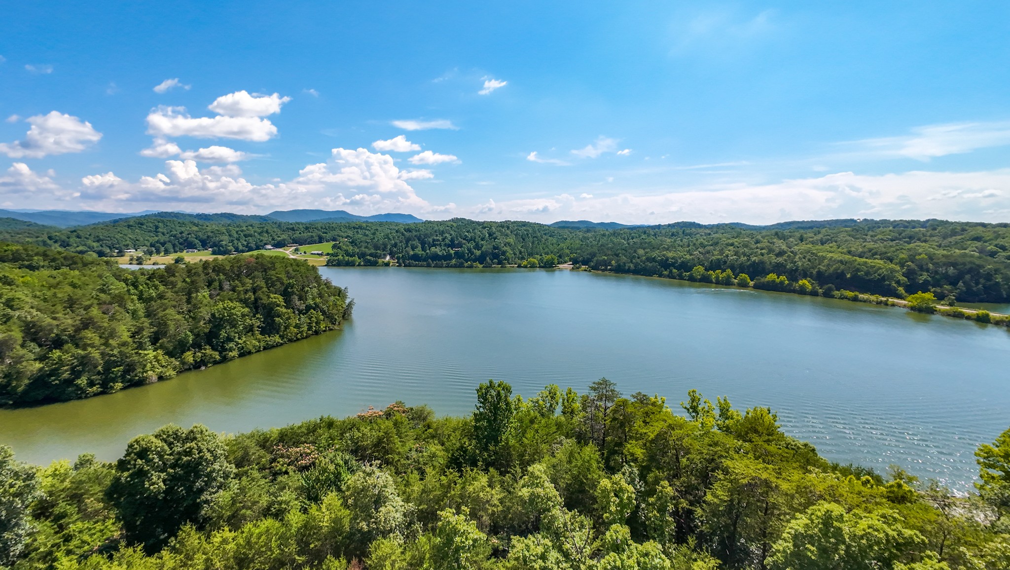 151 Citico Road Vonore, TN 37885 - Photo 7 of 23 a view of a lake with a mountain