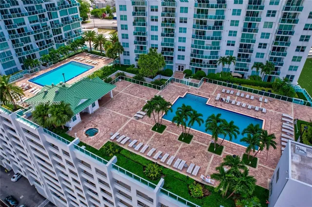 a view of a livingroom with furniture and a natural light