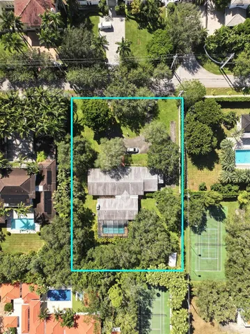 an aerial view of residential house with outdoor space