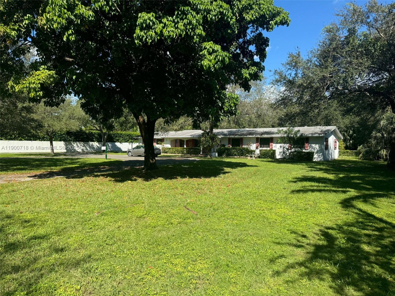 5345 Southwest 84th Street Miami, FL 33143 - Photo 12 of 15 a view of a park with large trees